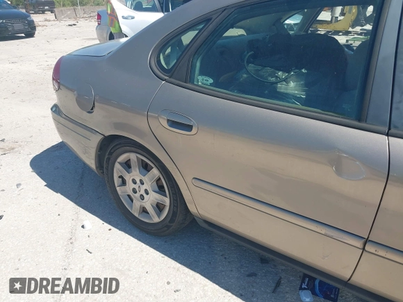 2006 Ford Taurus SE with VIN 1FAFP53U96A223924, listed as a IAAI auction lot 41828443 with 114,653 mi miles. Bid and sale history available at carsss.com. Image 16.