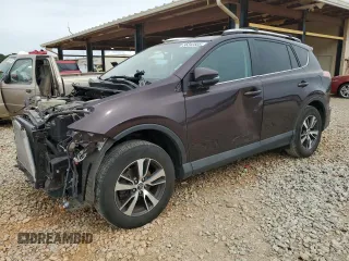 2016 Toyota RAV4 XLE with VIN 2T3RFREV9GW516247, listed as a Copart auction lot 56342505 with 105,718 mi miles and Salvage title. Bid and sale history available at DreamBid. Image 1.