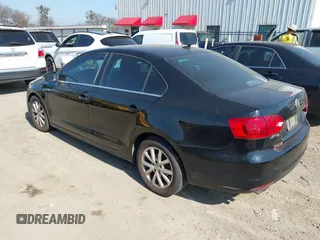 2013 Volkswagen Jetta SE z VIN 3VWDX7AJ2DM438211, wystawiony jako IAAI lot #41500230 z przebiegiem 176 525 mil mil oraz . Historia ofert i sprzedaży dostępna na DreamBid. Obrazek 3.