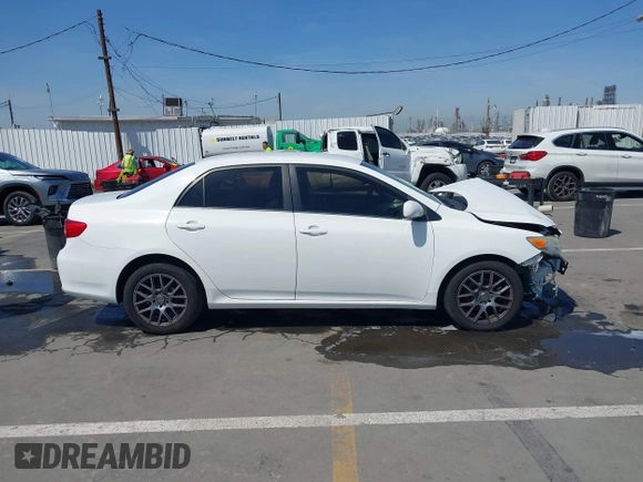 2013 Toyota Corolla L with VIN JTDBU4EE1DJ116557, listed as a IAAI auction lot 41981691 with 169,898 mi miles. Bid and sale history available at carsss.com. Image 14.