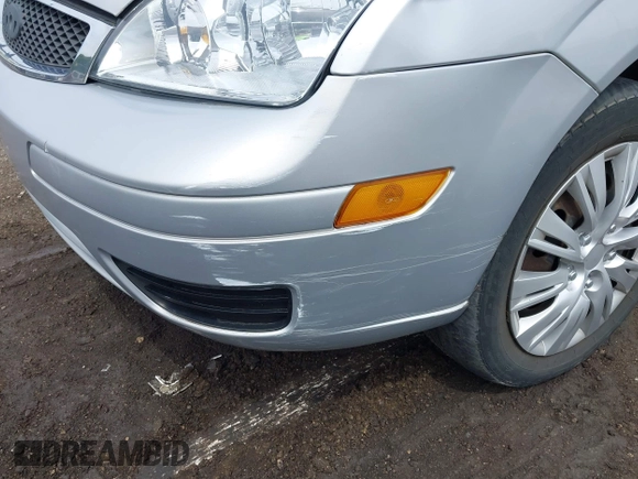 2007 Ford Focus S with VIN 1FAFP34N07W141693, listed as a IAAI auction lot 42310938 with 150,489 mi miles and . Bid and sale history available at DreamBid. Image 6.