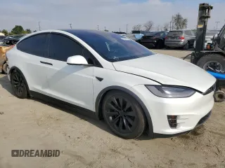2021 Tesla Model X Long Range Plus with VIN 5YJXCBE22MF311576, listed as a Copart auction lot 53541595 with 83,137 mi miles and Salvage Title. Bid and sale history available at carsss.com. Image 4.