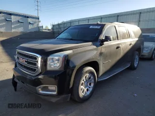 2015 GMC Yukon XL SLT z VIN 1GKS2HKC6FR242342, wystawiony jako Copart lot #56542915 z przebiegiem 176 523 mil mil oraz Szkoda całkowita • Salvage title. Historia ofert i sprzedaży dostępna na DreamBid. Obrazek 1.