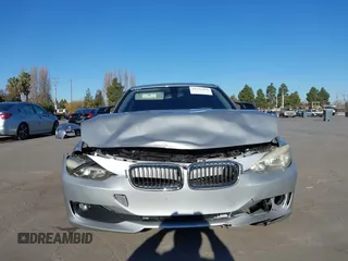 2015 BMW 3 Series 328i with VIN WBA3A5C57FF609054, listed as a IAAI auction lot 41330498 with 129,378 mi miles. Bid and sale history available at carsss.com. Image 12.