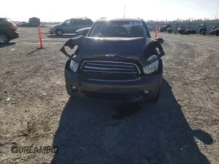 2012 MINI Countryman with VIN WMWZB3C58CWM03815, listed as a Copart auction lot 50097405 with 84,137 mi miles and Salvage Title. Bid and sale history available at DreamBid. Image 11.