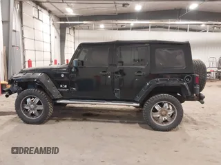 2008 Jeep Wrangler Unlimited X with VIN 1J4GA391X8L558984, listed as a IAAI auction lot 41016498 with 123,308 mi miles. Bid and sale history available at carsss.com. Image 14.