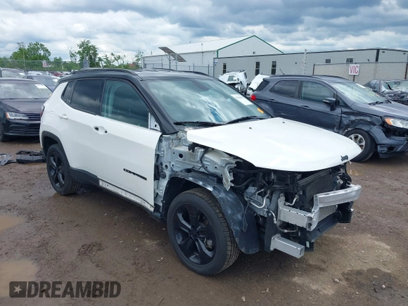 2021 Jeep Compass Altitude with VIN 3C4NJDBBXMT586529, listed as a IAAI auction lot 42296016 with 71,789 mi miles and . Bid and sale history available at DreamBid. Image 1.