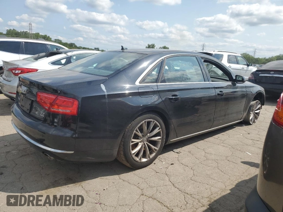 2011 Audi A8 z VIN WAURVAFD9BN005595, wystawiony jako Copart lot #66302644 z przebiegiem 106 610 mil mil oraz Nie do naprawy. Historia ofert i sprzedaży dostępna na DreamBid. Obrazek 3.