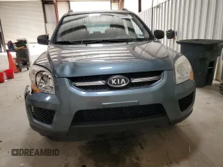 2009 Kia Sportage LX with VIN KNDJE723X97561560, listed as a Copart auction lot 49766995 with 130,623 mi miles and Salvage Title. Bid and sale history available at DreamBid. Image 5.