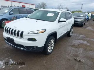 2014 Jeep Cherokee Limited with VIN 1C4PJMDB2EW281396, listed as a IAAI auction lot 42075036 with 113,578 mi miles and . Bid and sale history available at DreamBid. Image 2.