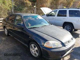 1997 Honda Civic EX with VIN 2HGEJ8645VH566736, listed as a IAAI auction lot 41876647 with 277,968 mi miles. Bid and sale history available at carsss.com. Image 1.