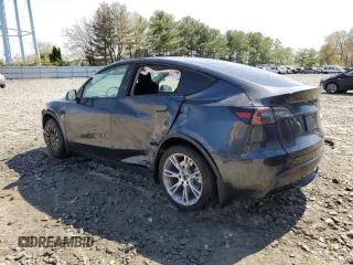 2024 Tesla Model Y Long Range with VIN 7SAYGDEE4RF990274, listed as a Copart auction lot 54239025 with 8,726 mi miles and Salvage title. Bid and sale history available at DreamBid. Image 2.