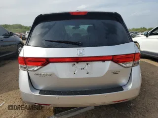 2014 Honda Odyssey Touring with VIN 5FNRL5H93EB034263, listed as a Copart auction lot 57254485 with 150,084 mi miles and Salvage title. Bid and sale history available at DreamBid. Image 6.