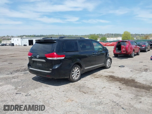 2011 Toyota Sienna XLE with VIN 5TDDK3DC2BS024429, listed as a IAAI auction lot 42091570 with 159,398 mi miles and . Bid and sale history available at DreamBid. Image 4.