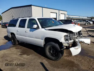 2002 GMC Yukon XL SLT with VIN 1GKEC16ZX2J121564, listed as a Copart auction lot 76110464 with 0 mi miles and Salvage Title. Bid and sale history available at carsss.com. Image 4.