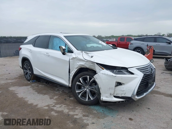 2018 Lexus RX 350L Premium z VIN JTJDZKCAXJ2010125, wystawiony jako IAAI lot #41899420 z przebiegiem 113 995 mil mil oraz . Historia ofert i sprzedaży dostępna na DreamBid. Obrazek 1.