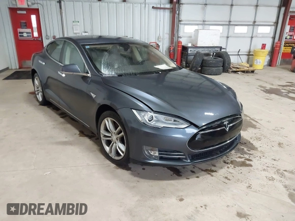2014 Tesla Model S 60 with VIN 5YJSA1H16EFP52853, listed as a IAAI auction lot 41941989 with 132,038 mi miles and . Bid and sale history available at DreamBid. Image 1.