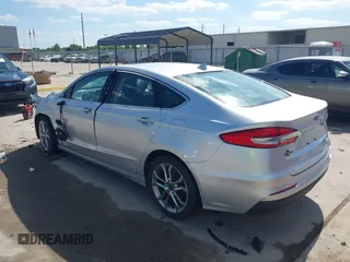 2019 Ford Fusion SEL with VIN 3FA6P0CD2KR116863, listed as a IAAI auction lot 42011256 with 72,676 mi miles. Bid and sale history available at carsss.com. Image 3.