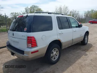 2002 Mercury Mountaineer Convenience z VIN 4M2ZU86W32ZJ21765, wystawiony jako IAAI lot #42209425 z przebiegiem 135 090 mil mil oraz . Historia ofert i sprzedaży dostępna na DreamBid. Obrazek 4.