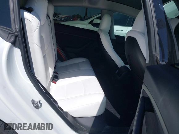 2023 Tesla Model 3 z VIN 5YJ3E1EA5PF517893, wystawiony jako IAAI lot #42515181 z przebiegiem 38 538 mil mil oraz . Historia ofert i sprzedaży dostępna na DreamBid. Obrazek 8.