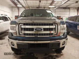 2014 Ford F-150 XL with VIN 1FTFW1ET1EKD06590, listed as a IAAI auction lot 41217519 with 155,792 mi miles and . Bid and sale history available at DreamBid. Image 13.
