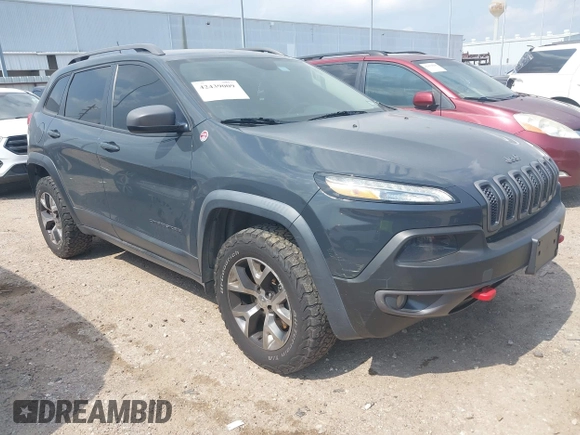 2016 Jeep Cherokee Trailhawk z VIN 1C4PJMBS0GW300131, wystawiony jako IAAI lot #42439009 z przebiegiem 173 571 mil mil oraz . Historia ofert i sprzedaży dostępna na DreamBid. Obrazek 1.