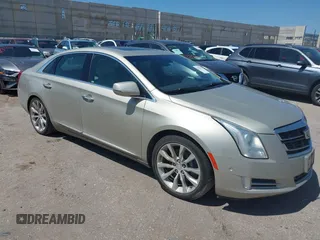 2016 Cadillac XTS Luxury Collection with VIN 2G61M5S32G9101153, listed as a IAAI auction lot 42523917 with 131,054 mi miles and . Bid and sale history available at DreamBid. Image 1.