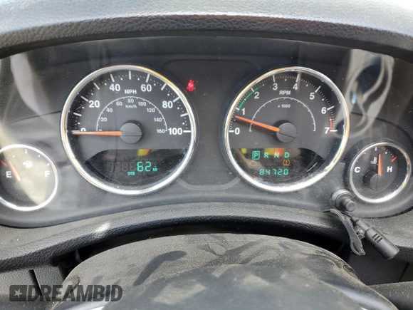 2013 Jeep Wrangler Unlimited Sport with VIN 1C4BJWDG8DL639781, listed as a Copart auction lot 63620025 with 84,720 mi miles and Salvage title. Bid and sale history available at DreamBid. Image 9.