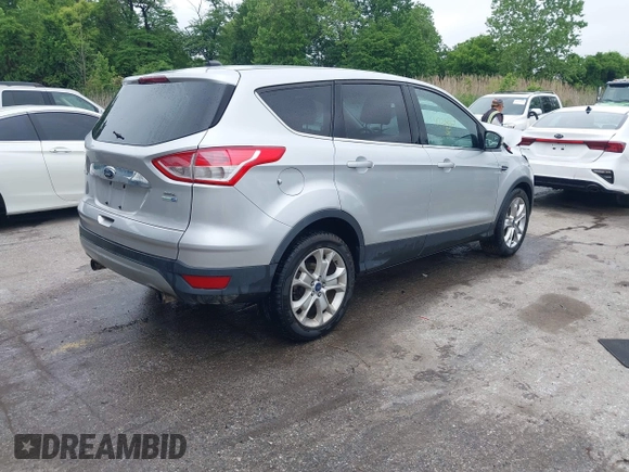 2013 Ford Escape SEL z VIN 1FMCU9H97DUA34665, wystawiony jako IAAI lot #42258567 z przebiegiem 174 227 mil mil oraz . Historia ofert i sprzedaży dostępna na DreamBid. Obrazek 4.