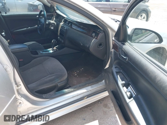 2014 Chevrolet Impala LT with VIN 2G1WB5E32E1146716, listed as a IAAI auction lot 41967440 with 143,593 mi miles and . Bid and sale history available at DreamBid. Image 5.