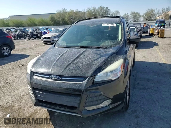 2013 Ford Escape SE with VIN 1FMCU0GX8DUA38056, listed as a Copart auction lot 57617885 with 128,467 mi miles and Salvage title. Bid and sale history available at DreamBid. Image 14.