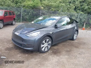 2021 Tesla Model Y Long Range z VIN 5YJYGDEE6MF070068, wystawiony jako IAAI lot #42224634 z przebiegiem 33 850 mil mil oraz . Historia ofert i sprzedaży dostępna na DreamBid. Obrazek 2.