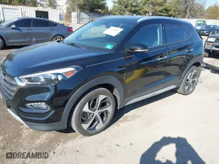 2018 Hyundai Tucson Value with VIN KM8J3CA26JU700642, listed as a IAAI auction lot 41655085 with 80,903 mi miles. Bid and sale history available at carsss.com. Image 18.