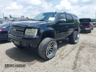 2007 Chevrolet Tahoe LT z VIN 1GNFK13067R331734, wystawiony jako IAAI lot #42372797 z przebiegiem 173 150 mil mil oraz . Historia ofert i sprzedaży dostępna na DreamBid. Obrazek 19.