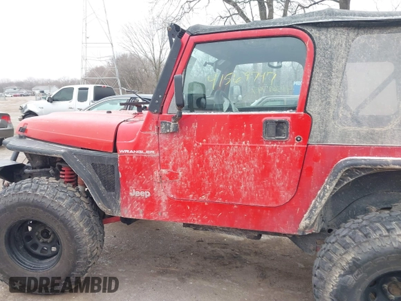 2002 Jeep Wrangler X z VIN 1J4FA39S52P708519, wystawiony jako IAAI lot #41569747 z przebiegiem 219 168 mil mil oraz . Historia ofert i sprzedaży dostępna na DreamBid. Obrazek 14.