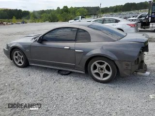 2003 Ford Mustang GT Deluxe with VIN 1FAFP42X13F392646, listed as a Copart auction lot 57938995 with 117,732 mi miles and Salvage title. Bid and sale history available at DreamBid. Image 2.