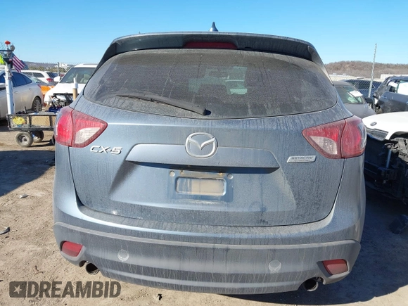 2016 Mazda CX-5 Sport with VIN JM3KE2BY3G0641895, listed as a IAAI auction lot 41689138 with 121,636 mi miles and . Bid and sale history available at DreamBid. Image 17.