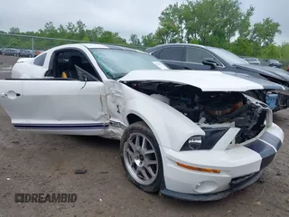 2007 Ford Mustang Shelby GT500 z VIN 1ZVHT88SX75317986, wystawiony jako IAAI lot #42310721 z przebiegiem 44 643 mil mil oraz . Historia ofert i sprzedaży dostępna na DreamBid. Obrazek 1.