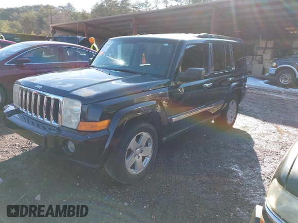 2010 Jeep Commander Sport with VIN 1J4RH4GK3AC125485, listed as a IAAI auction lot 41274416 with 185,259 mi miles and . Bid and sale history available at DreamBid. Image 2.