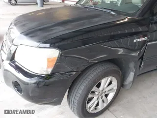 2007 Toyota Highlander Hybrid w/3rd Row with VIN JTEEW21A570035193, listed as a IAAI auction lot 41571679 with 143,627 mi miles. Bid and sale history available at carsss.com. Image 6.