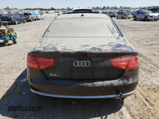 2013 Audi A8 3.0L with VIN WAURGAFD9DN004556, listed as a Copart auction lot 65018975 with 138,090 mi miles and Salvage title. Bid and sale history available at DreamBid. Image 6.