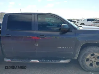 2015 Chevrolet Silverado 1500 LT with VIN 3GCUKREC2FG232302, listed as a IAAI auction lot 41652224 with 231,334 mi miles. Bid and sale history available at carsss.com. Image 13.