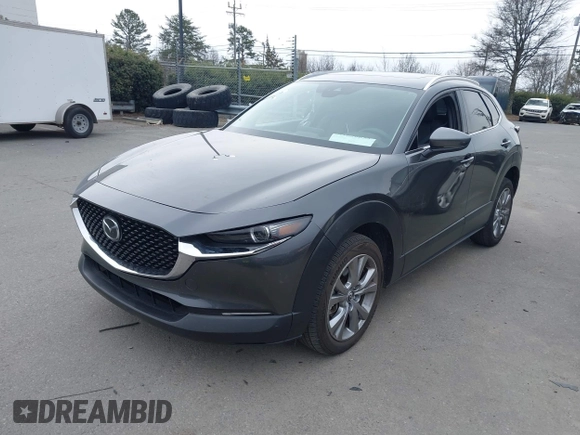 2022 Mazda CX-30 S Premium with VIN 3MVDMBDL9NM434619, listed as a IAAI auction lot 41620655 with 46,557 mi miles and . Bid and sale history available at carsss.com. Image 18.