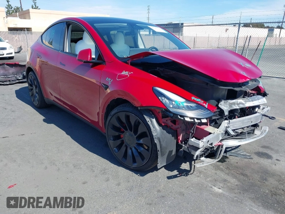 2021 Tesla Model Y Performance with VIN 5YJYGDEF4MF092062, listed as a IAAI auction lot 41583793 with 57,194 mi miles and . Bid and sale history available at DreamBid. Image 1.