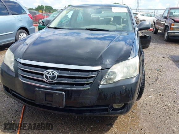 2007 Toyota Avalon XL z VIN 4T1BK36B87U184714, wystawiony jako IAAI lot #42243997 z przebiegiem 165 691 mil mil oraz . Historia ofert i sprzedaży dostępna na DreamBid. Obrazek 13.