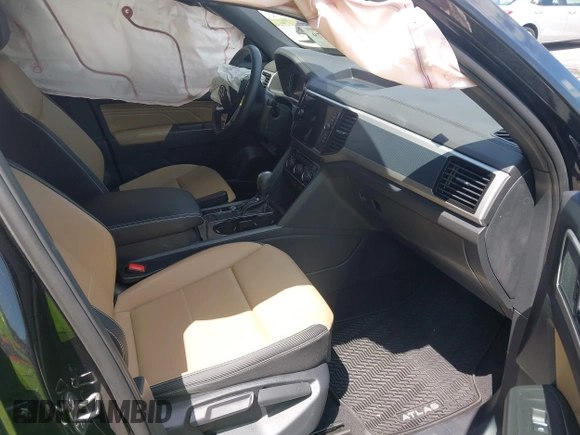 2023 Volkswagen Atlas SE with VIN 1V2WC2CA4PC217463, listed as a IAAI auction lot 41996379 with 13,578 mi miles and . Bid and sale history available at DreamBid. Image 5.