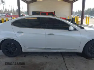 2014 Kia Cadenza Premium with VIN KNALN4D74E5138497, listed as a IAAI auction lot 41678439 with 155,194 mi miles. Bid and sale history available at carsss.com. Image 14.