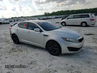 2012 Kia Optima EX z VIN 5XXGN4A75CG083916, wystawiony jako Copart lot #54954205 z przebiegiem 253 854 mil mil oraz Szkoda całkowita • Salvage title. Historia ofert i sprzedaży dostępna na DreamBid. Obrazek 14.