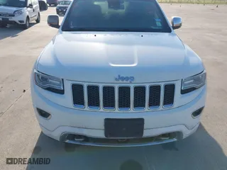 2014 Jeep Grand Cherokee Overland with VIN 1C4RJFCG6EC579985, listed as a IAAI auction lot 42025215 with 126,761 mi miles. Bid and sale history available at carsss.com. Image 6.