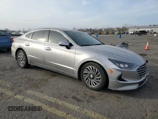 2020 Hyundai Sonata Hybrid Ultimate with VIN KMHL34JJ2LA010025, listed as a Copart auction lot 77657214 with 59,596 mi miles and Salvage Title. Bid and sale history available at carsss.com. Image 4.